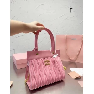 Women's MIU MIU Quilted Pink Leather Handbag with Golden Sling