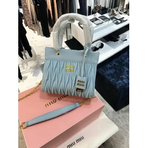 Women's MIU MIU Quilted Blue Leather Handbag with Sling