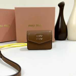Unisex Miu Miu Mini Leather Pouch Bag  Charm with Yellow cord